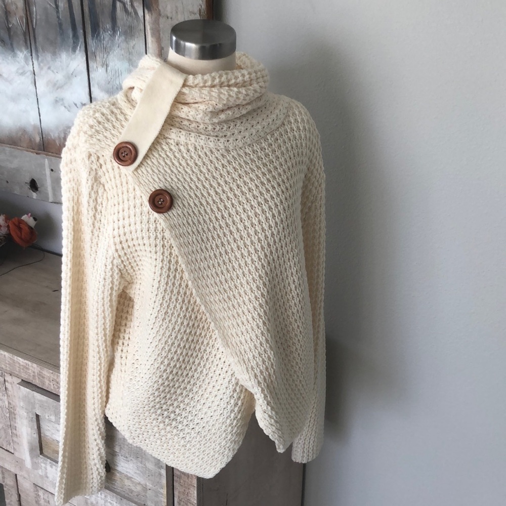 New, cream colored sweater